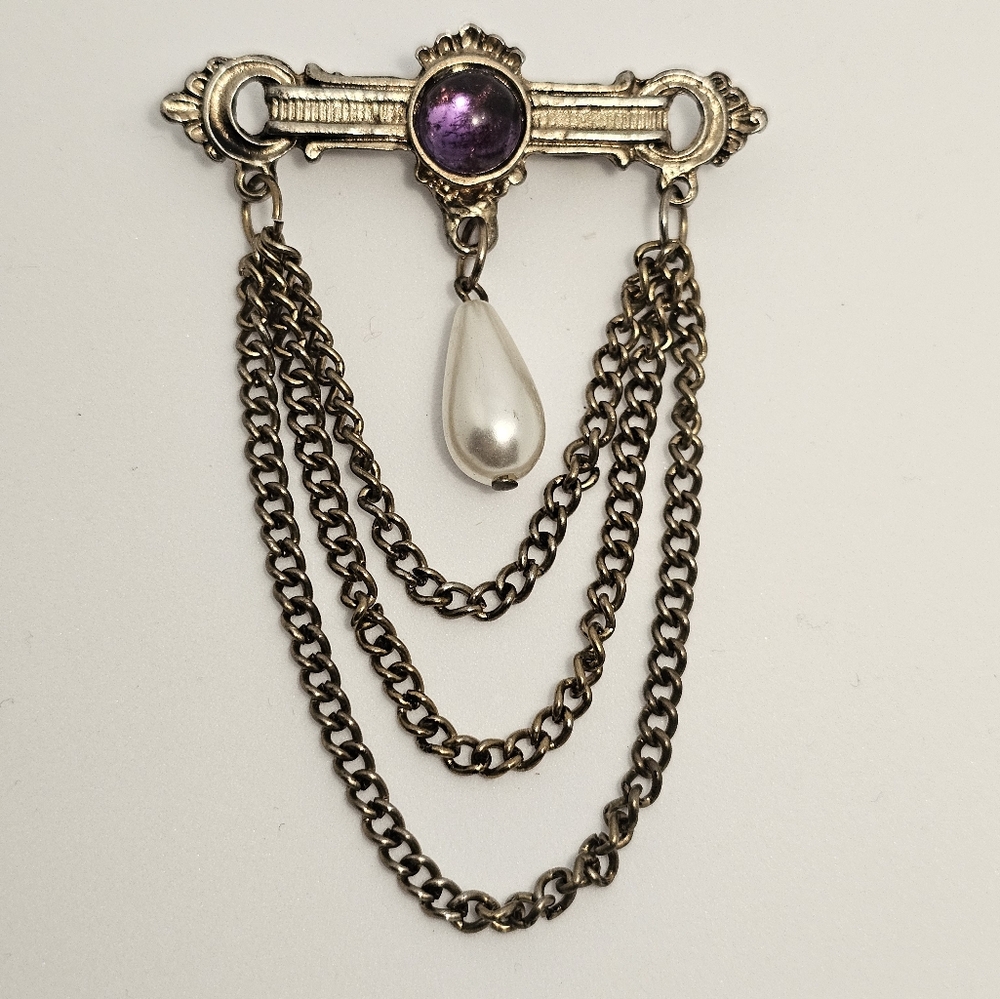 Gold and Purple Brooch with Chain Detail